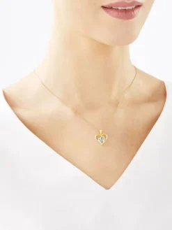 Zawieszka z żółtego złota z diamentem i topazem - serca - próba 375