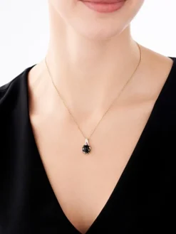 Zawieszka z żółtego złota z diamentami i onyksem - liść - próba 585