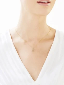 Zawieszka z żółtego złota z diamentem - litera M - 0,004 ct - próba 585