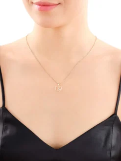 Zawieszka z żółtego złota z diamentem - litera S, serce - 0,005 ct - próba 375