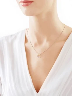 Zawieszka z żółtego złota z diamentem - serce - 0,005 ct - próba 375