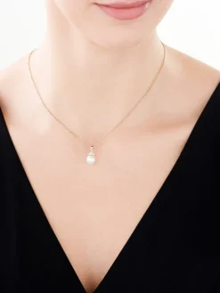 Zawieszka z żółtego złota z diamentami i perłą - próba 585