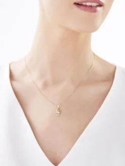 Zawieszka z żółtego złota z diamentem - medalik Matka Boska - 0,004 ct - próba 375