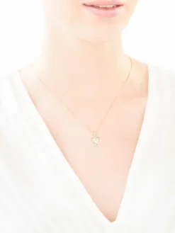 Zawieszka z żółtego złota z diamentami - medalik Matka Boska, serce - 0,01 ct - próba 375