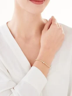 Złota bransoletka elastyczna z cyrkoniami bez zapięcia