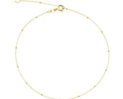 Złota bransoletka na nogę - kulki