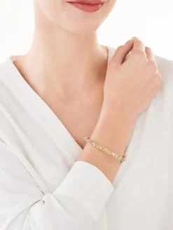 Złota bransoletka sztywna z zapięciem