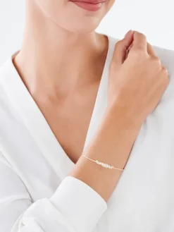 Złota bransoletka z cyrkoniami