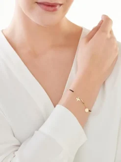 Złota bransoletka z cyrkoniami, ankier - samolot, koło