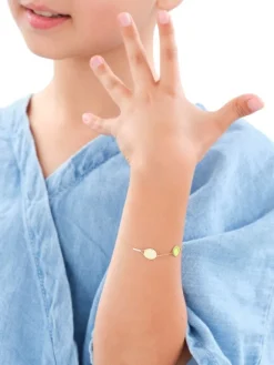 Złota bransoletka z emalią - piłka i rakieta tenisowa