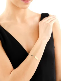 Złota bransoletka z emalią i blaszką - aparat fotograficzny