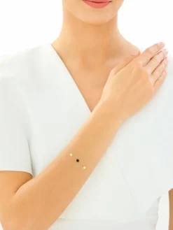 Złota bransoletka z onyksem syntetycznym - gwiazdy