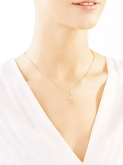 Złota zawieszka - krzyż