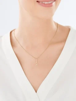 Złota zawieszka - małpa