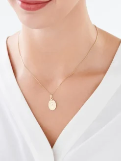 Złota zawieszka - medalik Matka Boska