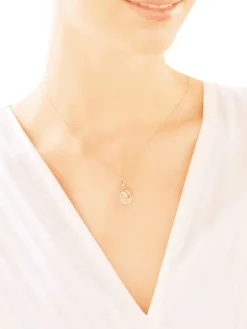 Złota zawieszka - medalik Matka Boska