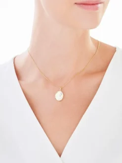 Złota zawieszka - puzderko - stópki