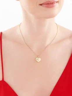 Złota zawieszka - puzderko - serce, stópki