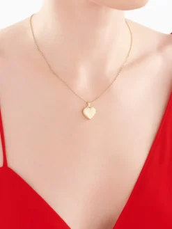 Złota zawieszka - puzderko - serce, stópki