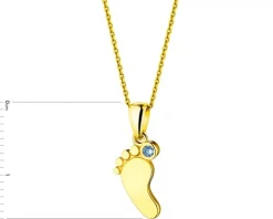 Złota zawieszka z akwamarynem syntetycznym - stópka