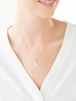 Złota zawieszka z akwamarynem syntetycznym - stópki