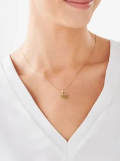 Złota zawieszka z akwamarynem syntetycznym -  stópki