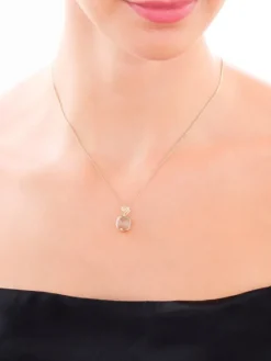 Złota zawieszka z ametystem