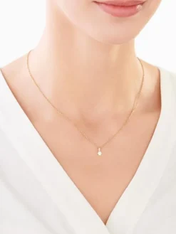 Złota zawieszka z cyrkonią