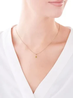 Złota zawieszka z cyrkonią