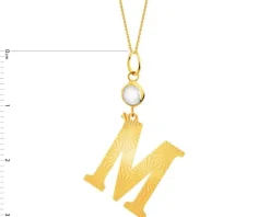Złota zawieszka z cyrkonią - litera M