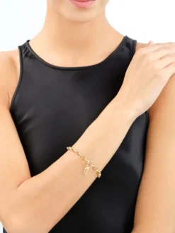 Złota zawieszka z cyrkonią charms - stópka