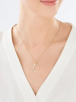 Złota zawieszka z cyrkoniami