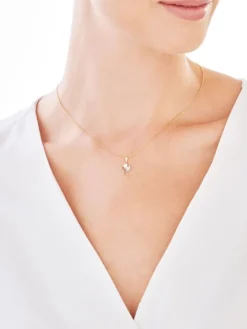 Złota zawieszka z cyrkoniami - aniołek