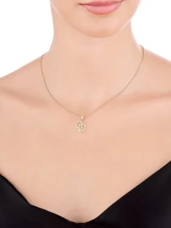 Złota zawieszka z cyrkoniami - stópki