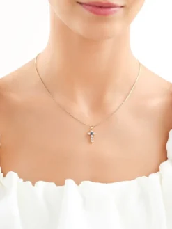 Złota zawieszka z cyrkoniami - krzyż