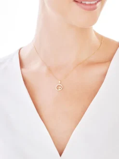 Złota zawieszka z cyrkoniami - aniołek