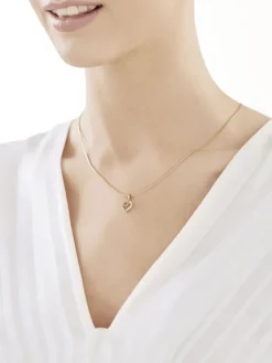 Złota zawieszka z cyrkoniami - serce