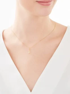 Złota zawieszka z cyrkoniami