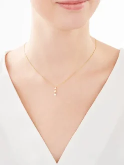 Złota zawieszka z cyrkoniami