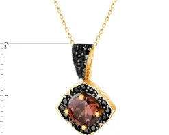 Złota zawieszka z cyrkoniami