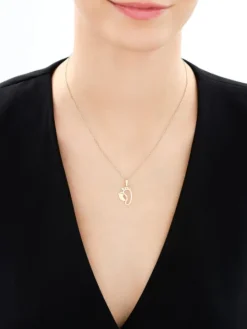 Złota zawieszka z cyrkoniami - stópki