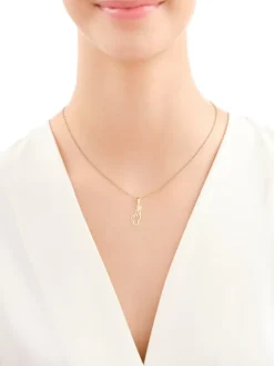 Złota zawieszka z cyrkoniami - dłoń