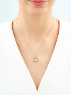 Złota zawieszka z cyrkoniami - rozeta