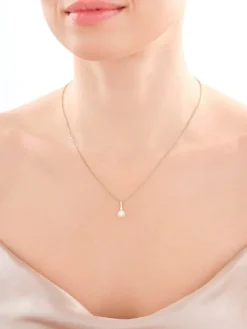 Złota zawieszka z cyrkoniami