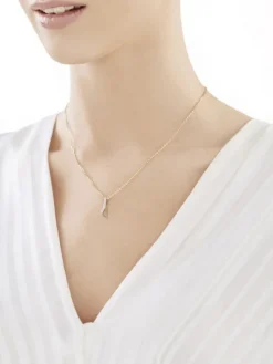 Złota zawieszka z cyrkoniami