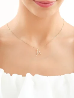 Złota zawieszka z cyrkoniami - litera M