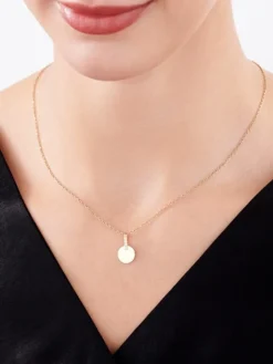 Złota zawieszka z cyrkoniami