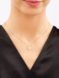 Złota zawieszka z cyrkoniami