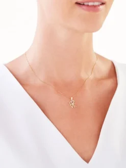 Złota zawieszka z cyrkoniami - love