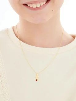 Złota zawieszka z emalią - litera K - biedronka